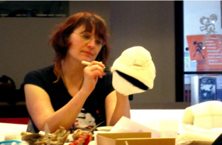 The author Chrystene Ells working on the head of a Parathyroid Punk character.